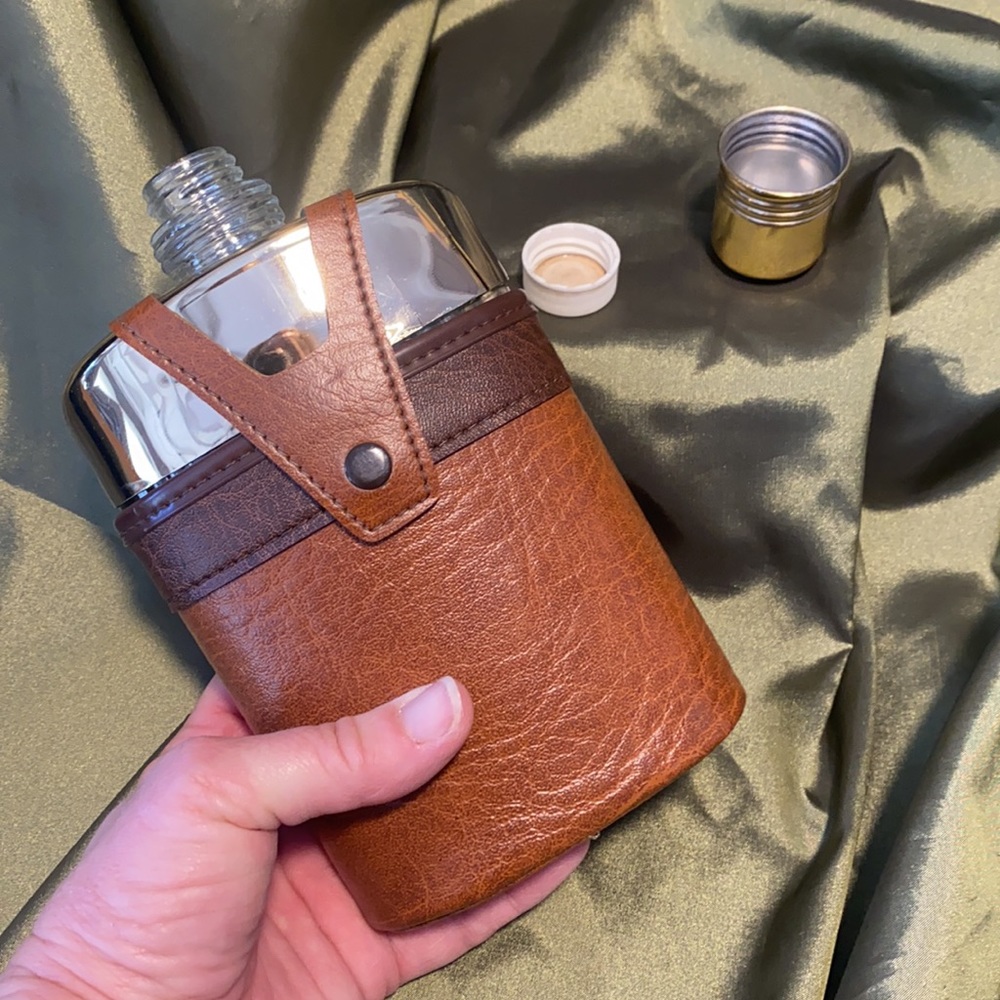 Noymer faux leather goldstone flask.Booze, liquor, cough syrup, belt, nip, juice